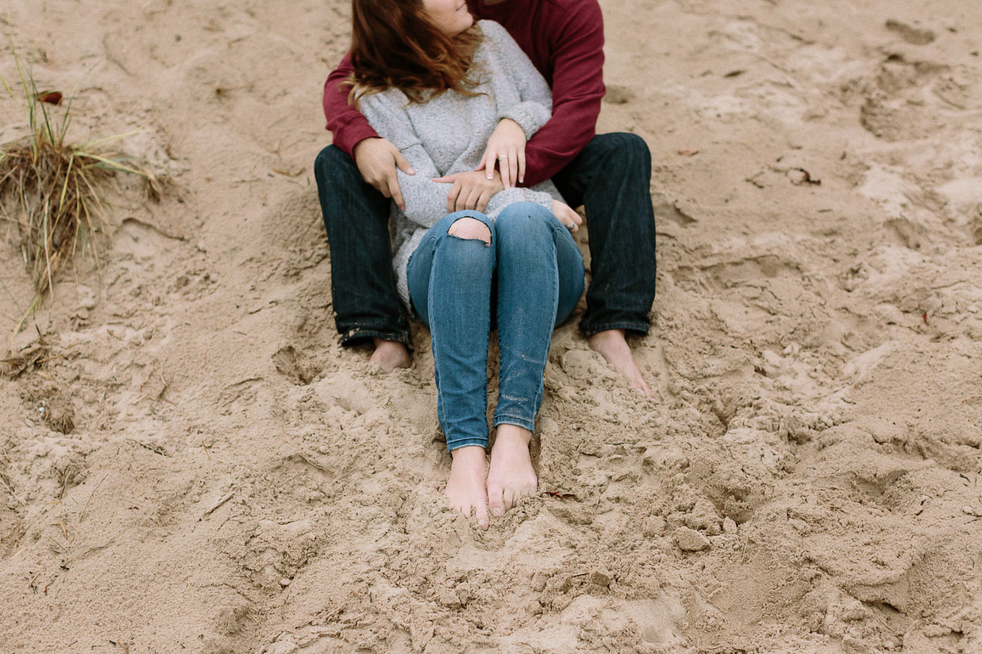 Couple's feet in sand