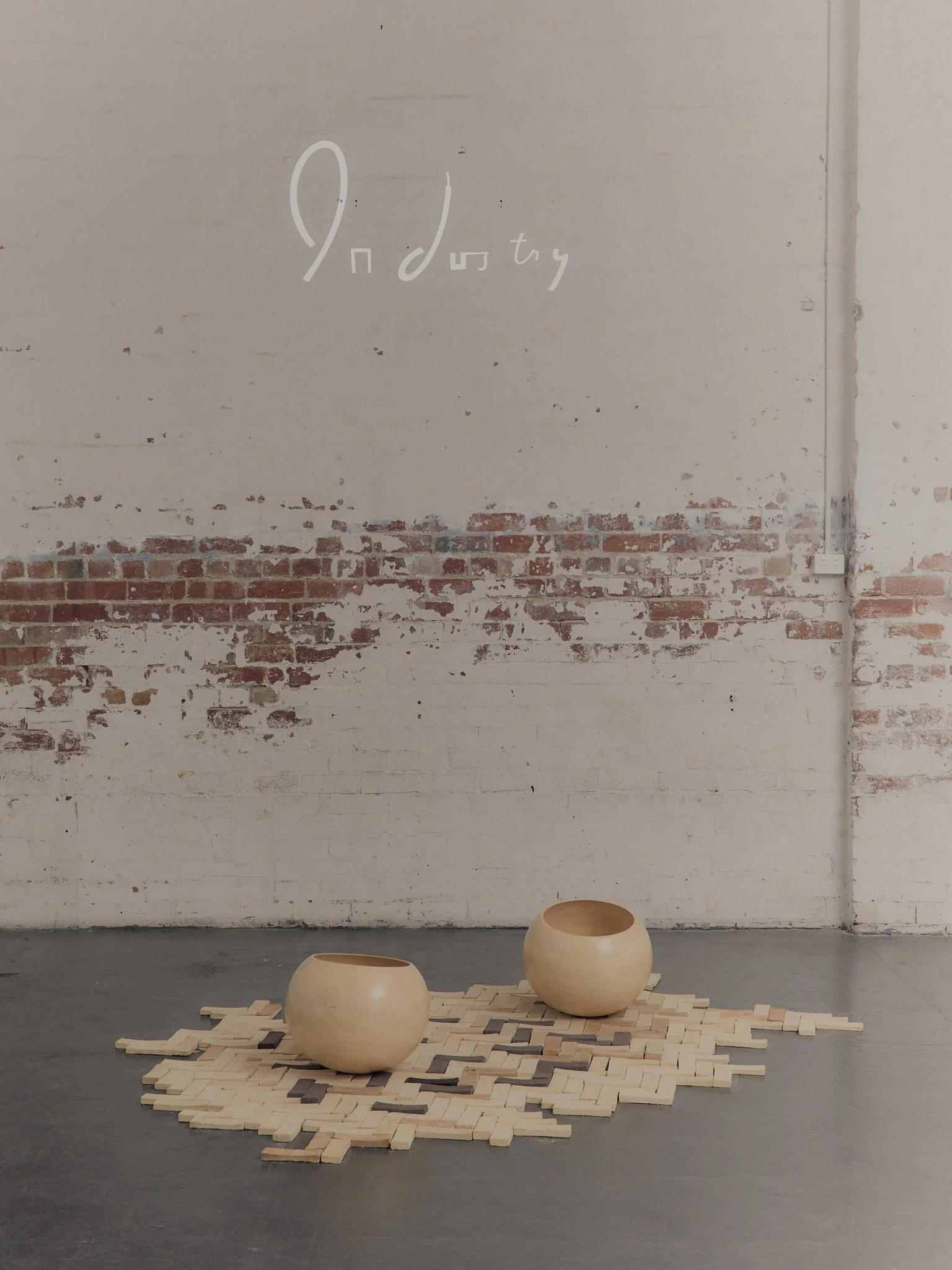 Timber Bowls sitting on bricks made of waste from their production process