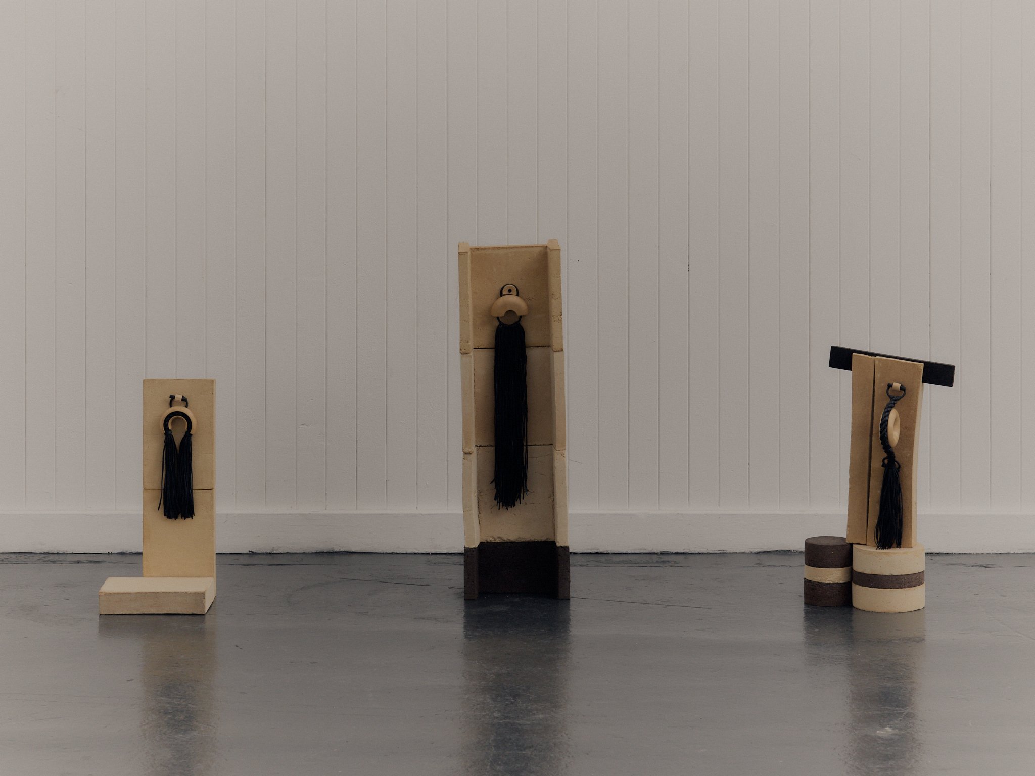 Timber + Rubber - Wall Dimples on Pulp Plinths.