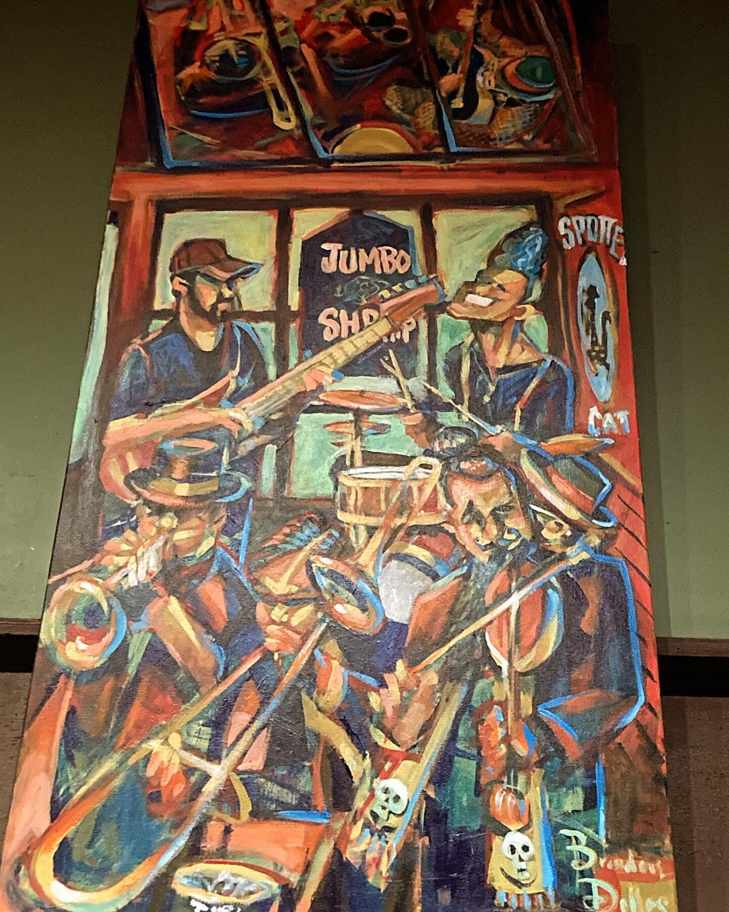 We have been immortalized in a painting by @brandondellesart ! Next time you&rsquo;re ordering a drink at the @spottedcatmusicclub , turn around, look up, and gaze into this dreamy shrimpscape 🦐🦐🦐🦐🦐🦐 

#jumboshrimp #neworleans #neworleansmusic 