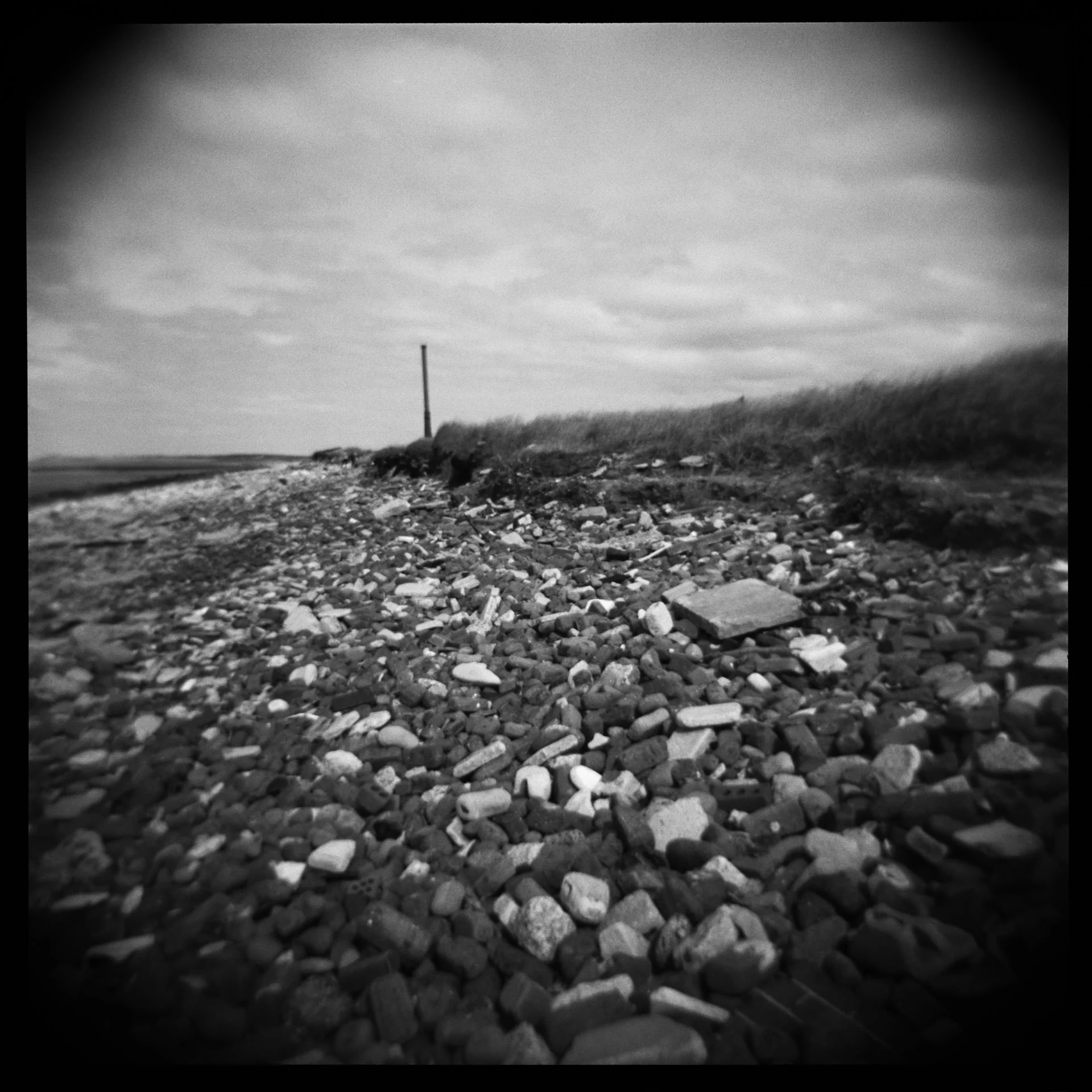 The last (and only) time I visited Crosby beach was several years ago to see Antony Gormley’s ‘Another Place’ sculptures. On this particular day we weren't there to look at his work and continued further north along the beach. Here you can find all sorts of washed up debris like tyres, bottles and masses of red bricks. 