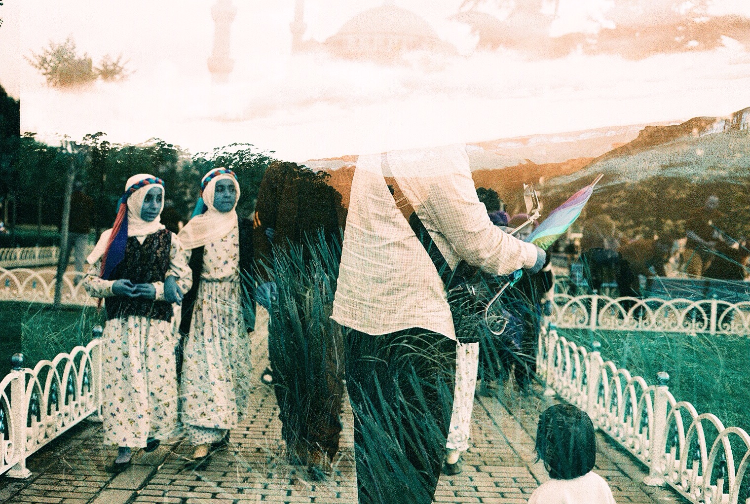 This photo was taken in NSW, Australia and Istanbul, Turkey on lomochrome turquoise film, in collaboration with @the.analog.erdalito . I love the look on the women's faces and the grass pants. I shot my photos in the Blue Mountains, a spectacular place even in winter. 