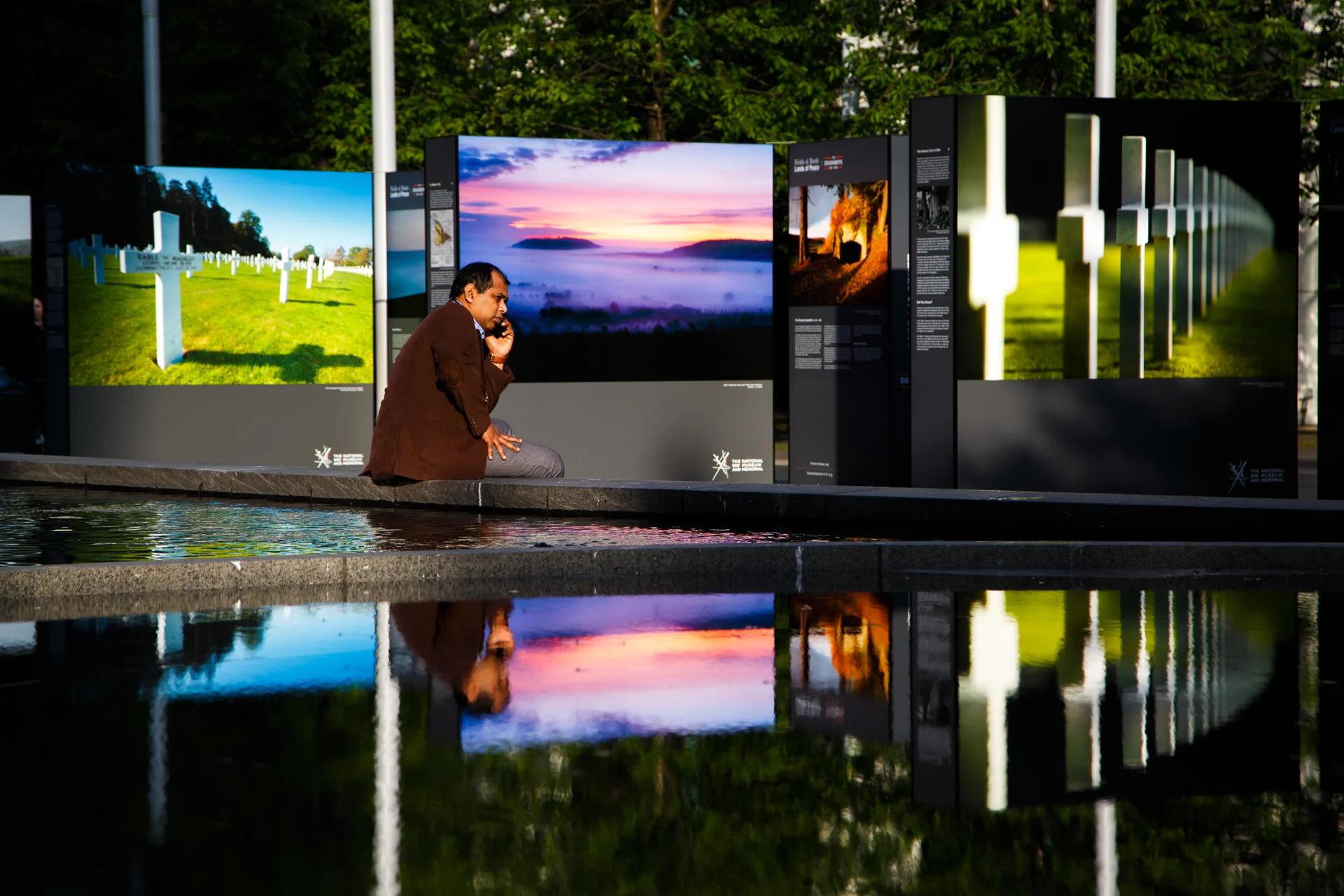 Monthly Digital Splash competitions gave me themes to focus on to go out and photograph - 'Street' was the theme when I saw this man on his phone in front of an outdoor photography exhibition...