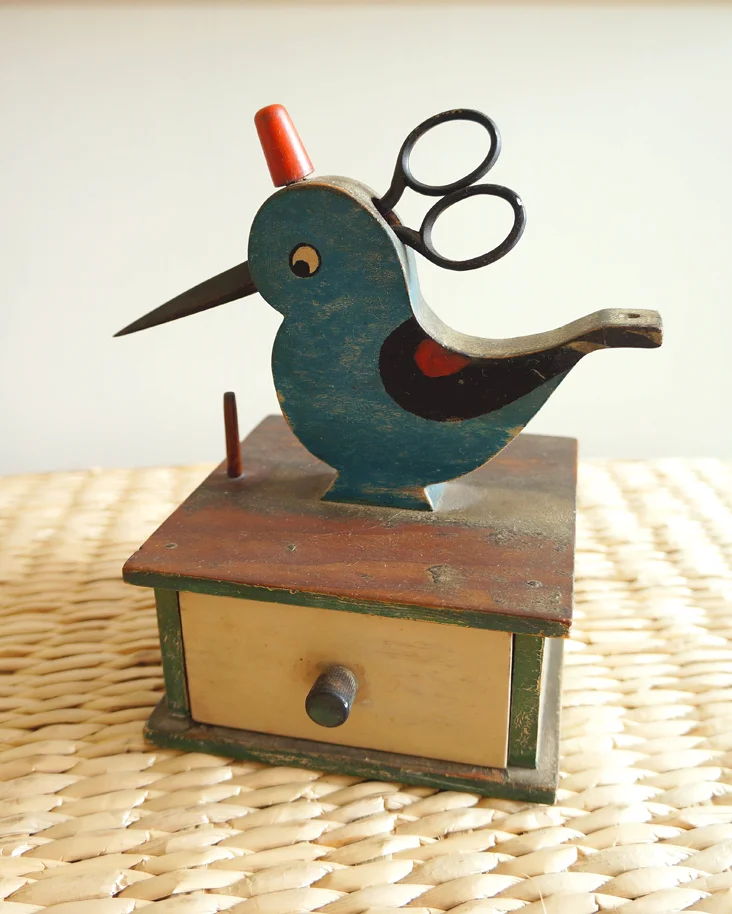 blue sewing bird