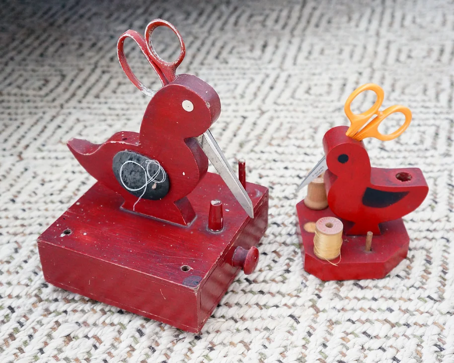 red painted sewing birds