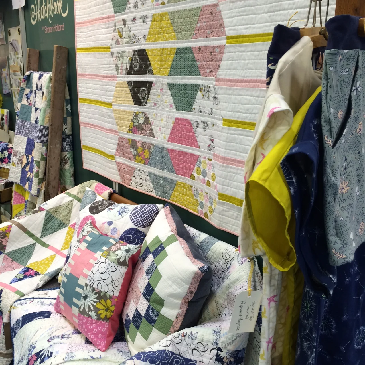 Sketchbook booth with Honeycomb quilt by Sharon Holland for Art Gallery Fabrics