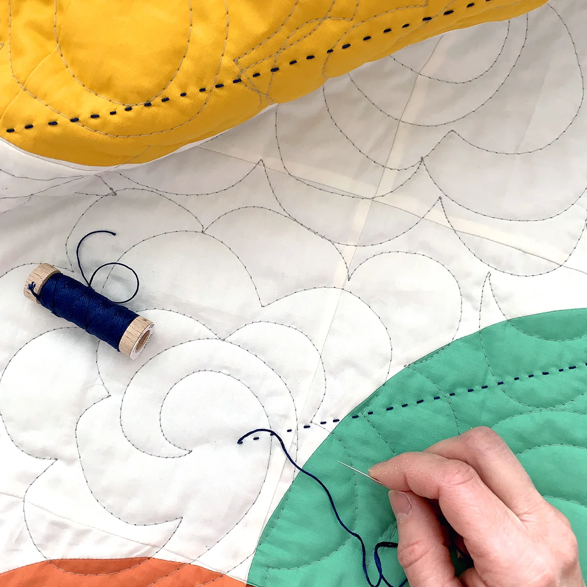 Hold Tight Quilt Hand Stitching.jpg