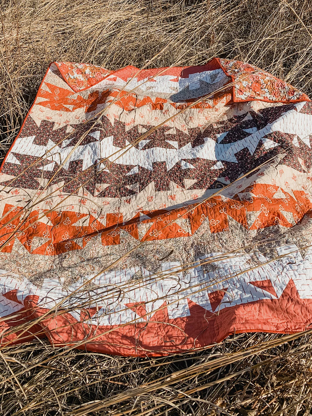 Rambler quilt in grass.jpg
