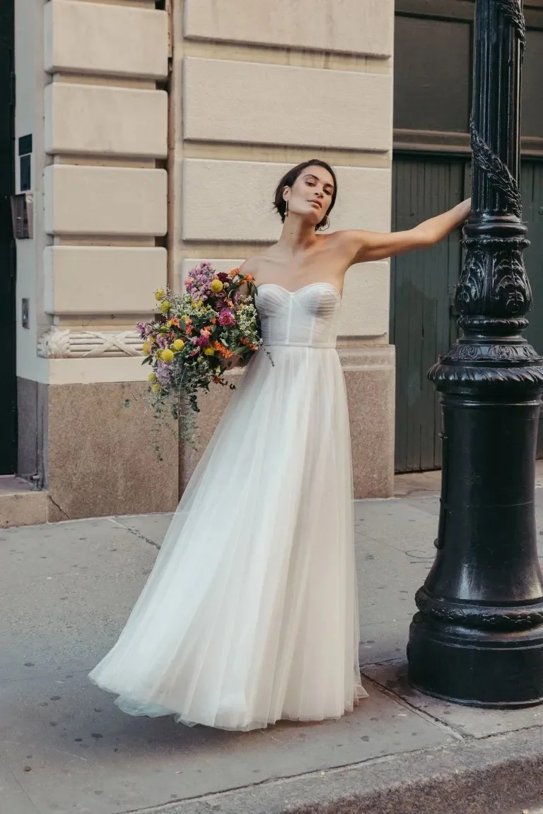 jenny yoo wedding dress Tristan Indulge in the enchanting versatility of the Jenny Yoo Evangeline gown. Jenny Yoo - Alta Moda