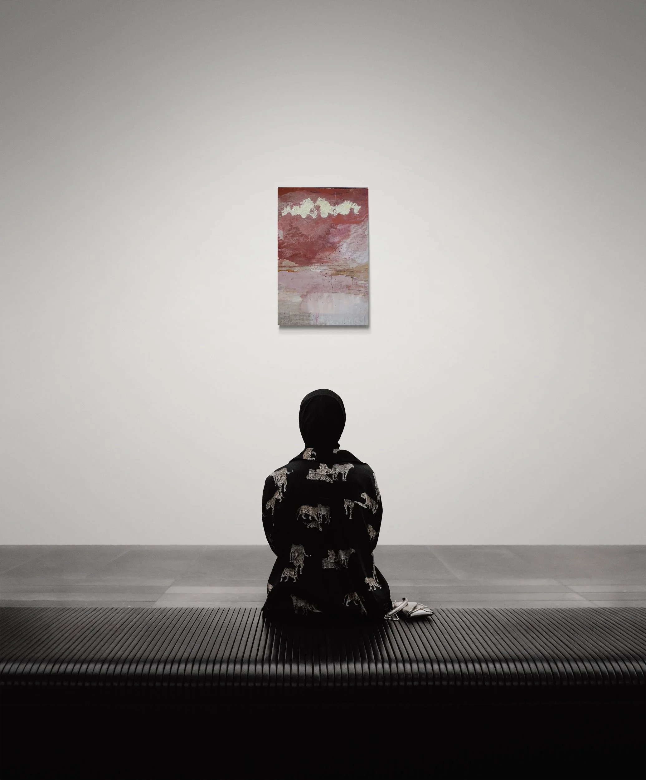 woman-sitting-on-a-bench-in-an-art-gallery (2).jpg