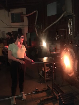 Me blowing glass at the glory hole. That’s what it’s called, a glory hole.