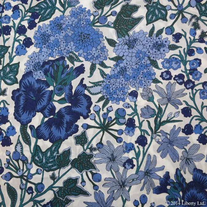 Liberty, Edna on Tana Lawn Cotton Featuring lily of the valley, wallflower, stitchwort, candytuft and ivy. Respectively, these flowers symbolise sweetness and humility, love, everlasting beauty, indifference, immortality and fidelity