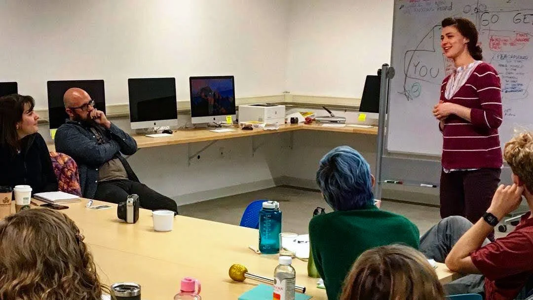 Jeff Simmermon listens as a participant rehearses a story during a coaching session.