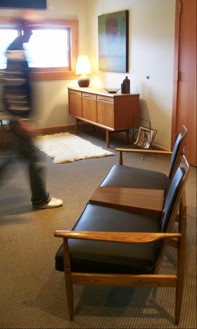 painting in the background by the lake at red rooster winery. furniture provided by object orange