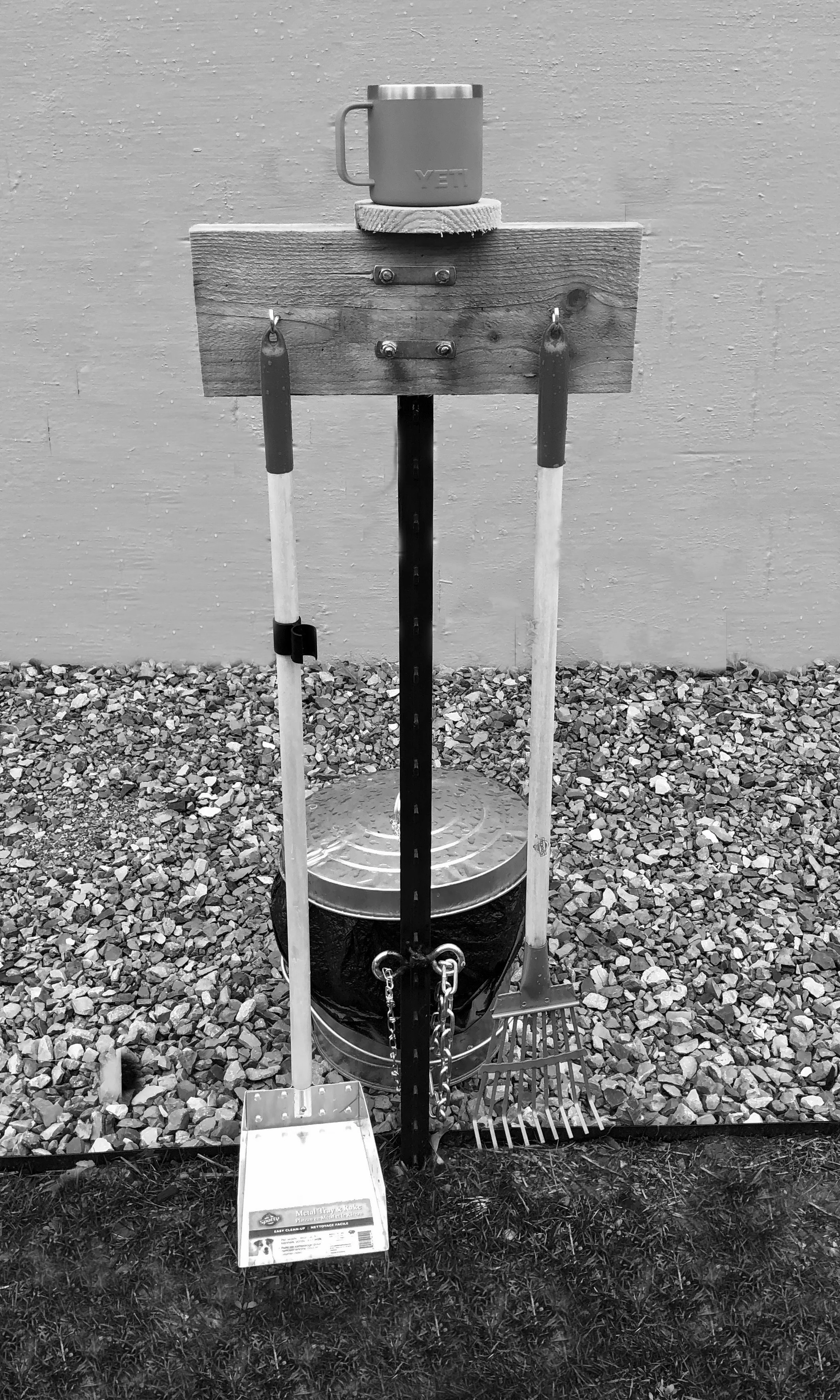 Pooper scooper tool station with coffee cup shelf