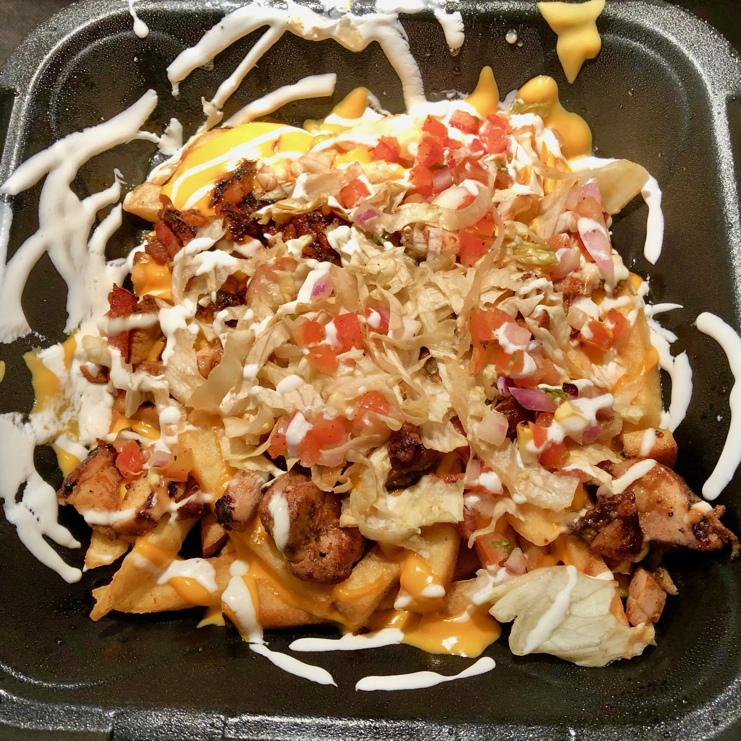 Loaded Fries with Jerk Chicken.jpeg