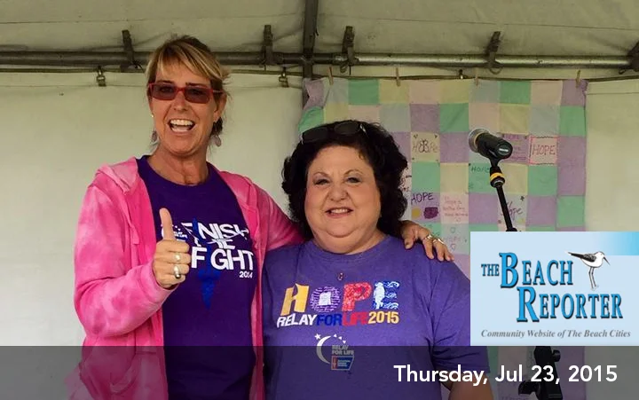 2x Cancer Survivor ACS Voice/ Hero of Hope Adrienne Slaughter gives a Thumbs Up to celebrating life with Event Chair Maria Stieritz at the Beach Cities Relay for Life on July 18, 2015.