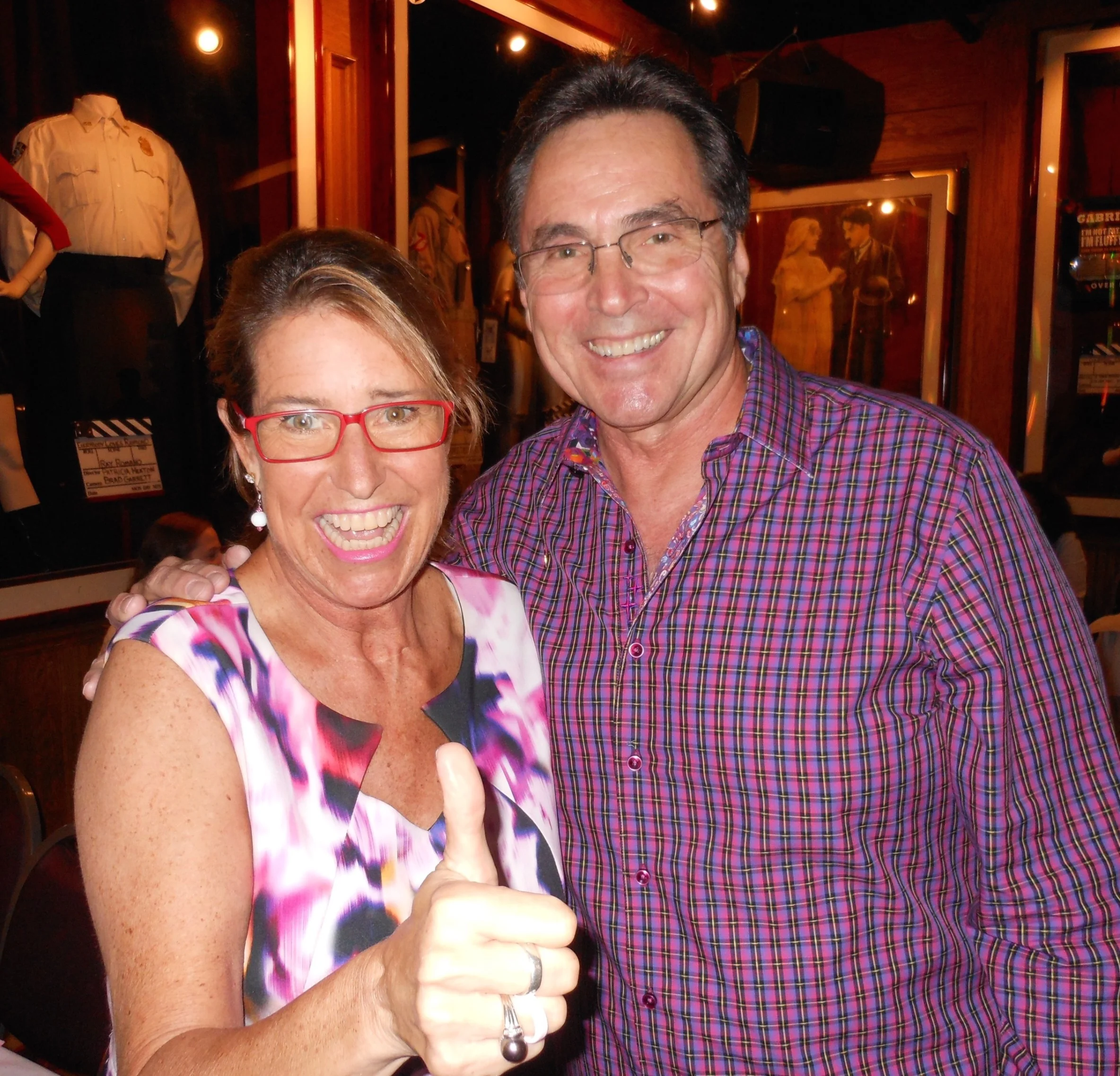 Keynote Speaker Adrienne Slaughter with Emcee David Plakos before her inspiring message onstage at sold-out Cancer Support Commuinity's Girls Night Out at Comedy & Magic Club on 10/6/16.
