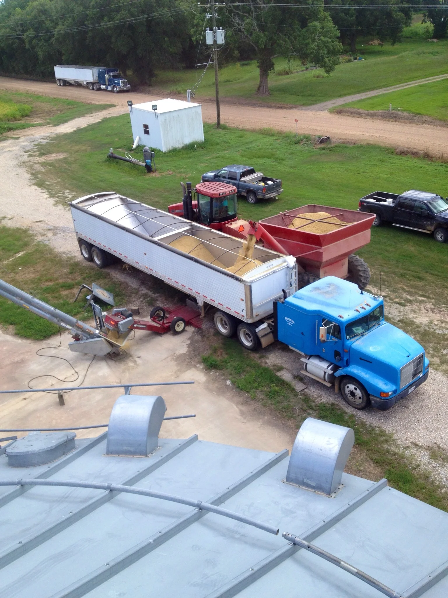 On top of the bins unloading trucks