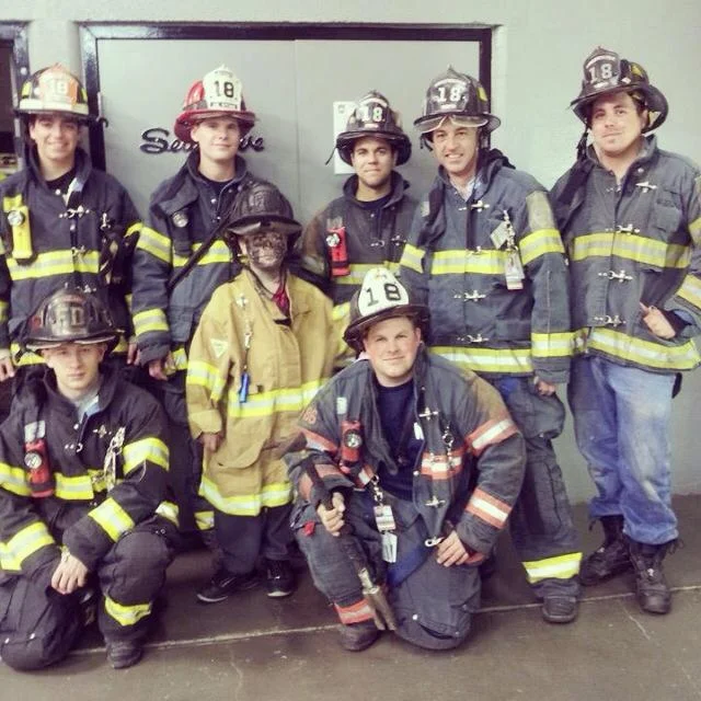 Brandon Koyste and Avery Lesher, members of the Western Berks Fire Department, pose for a picture with WBFD Deputy Chief, Ron Wentzel's son Josh, on Halloween after returning from a call.