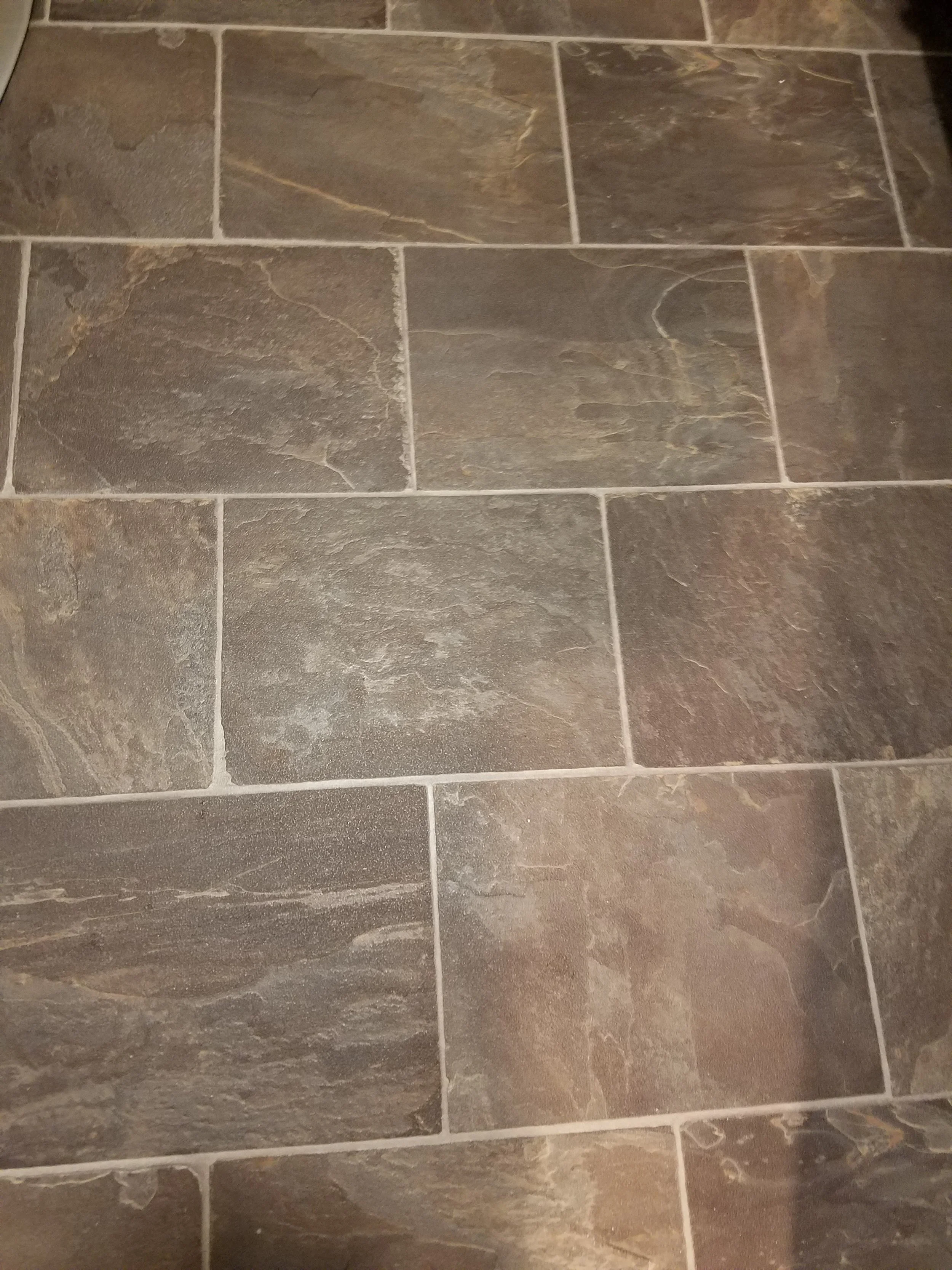 Vinyl flooring installed in a powder room