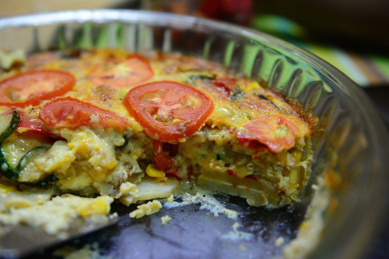 You can see the layers upon layers. Potatoes, veggies, corn, egg and tomatoes