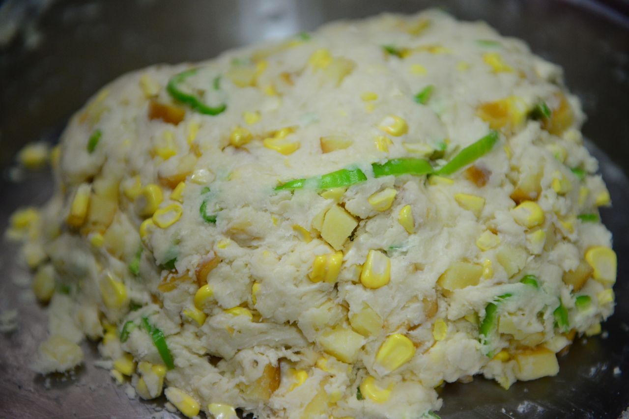 And bring it together into a mound of flour