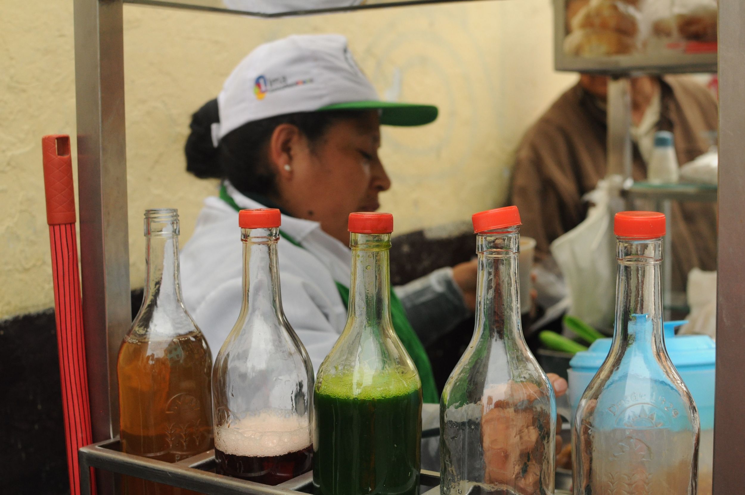 The lady making strange drinks with colourful syrups. Unlike gola these were served hot!