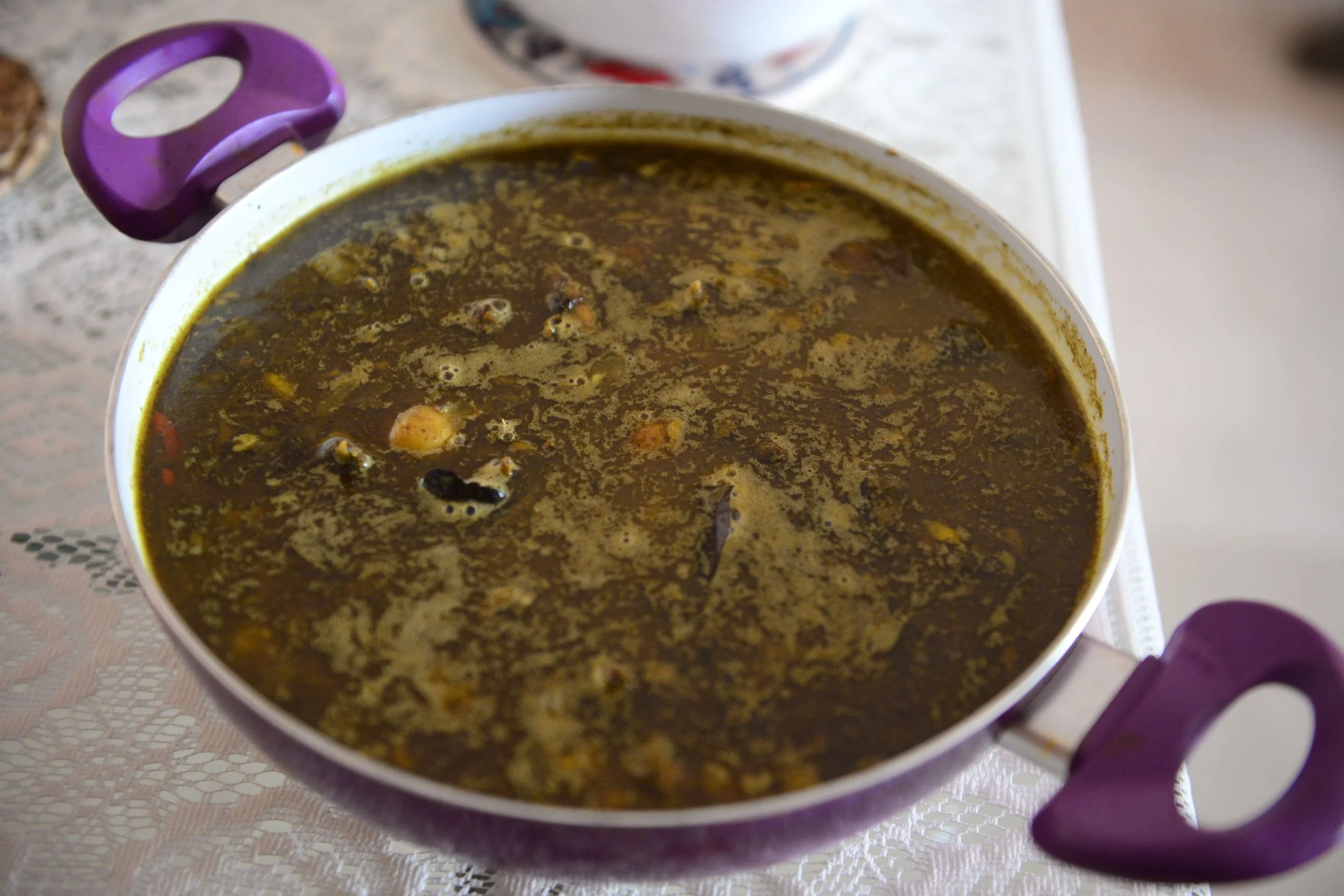 Alu aru Paro Manxoh Jalukia (peppery pigeon meat with potatoes)