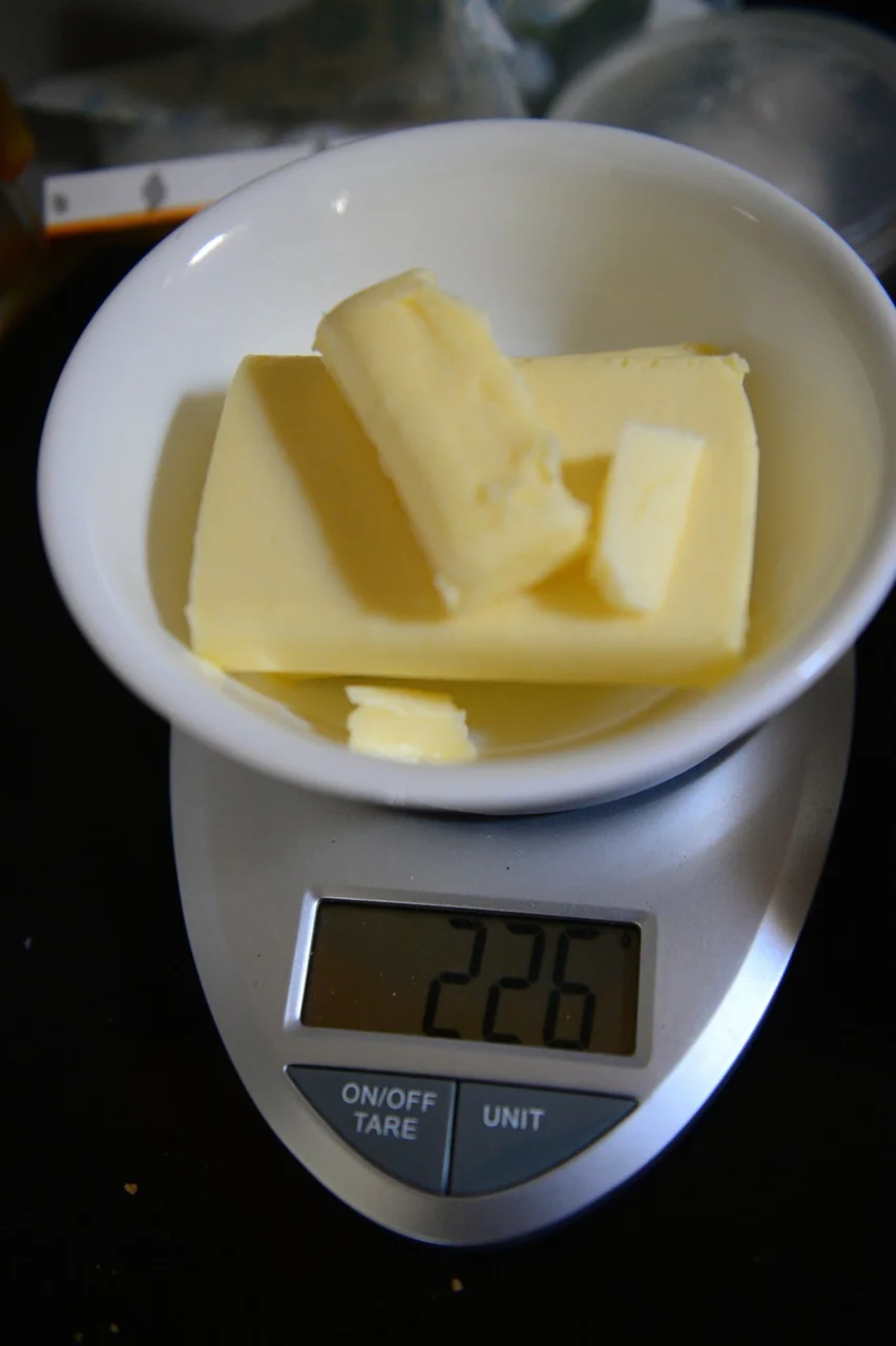 Measure 226 grams of butter (two sticks)