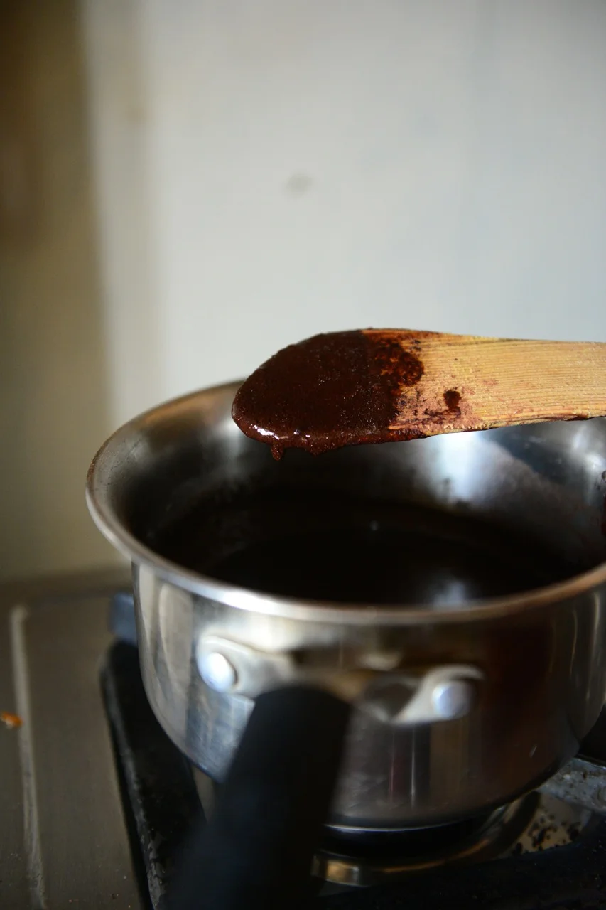 Add boiling water to the mixture till a smooth consistency