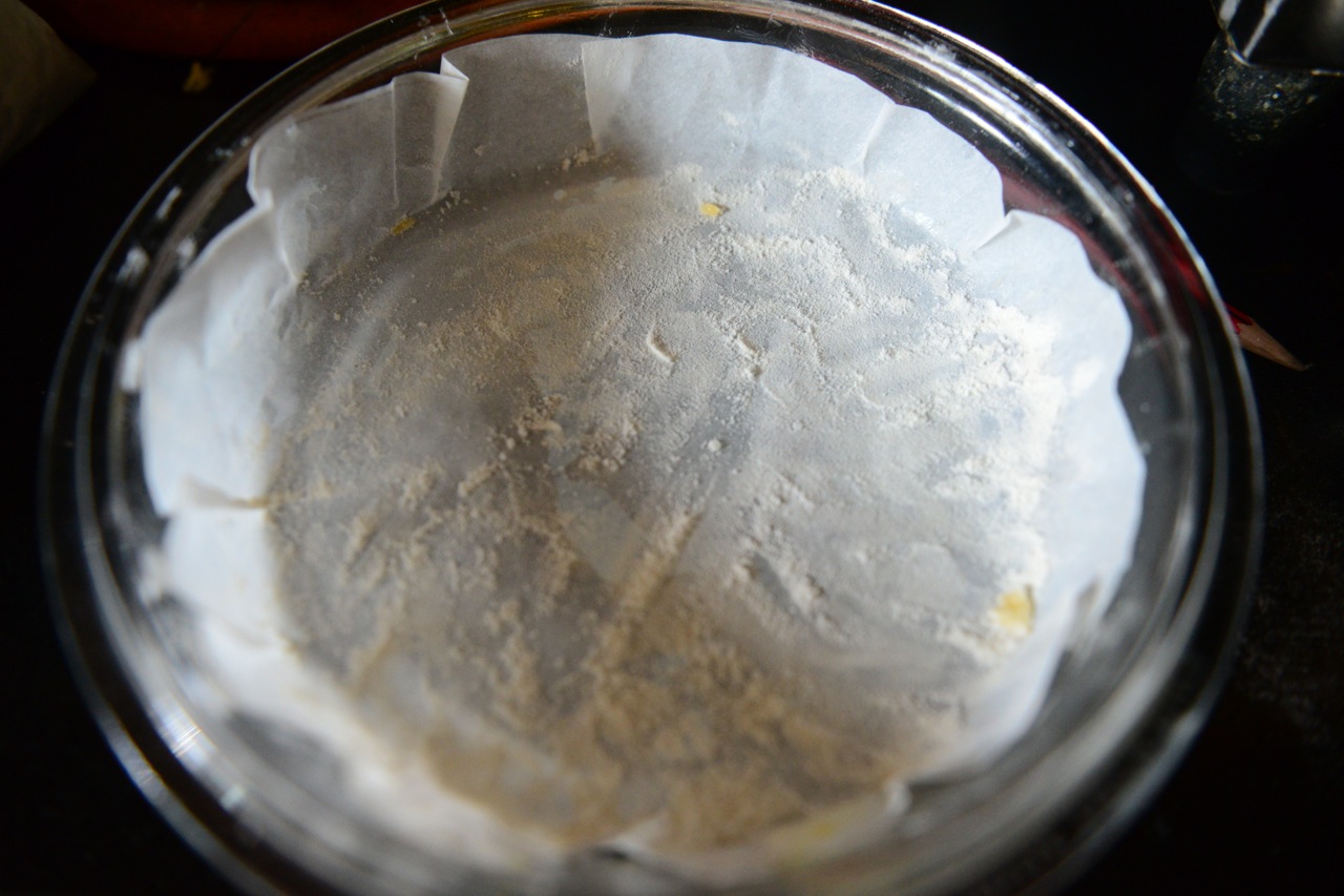 Line a baking bowl of approximately 7" diameter with parchment paper. I use my mom's pyrex ware