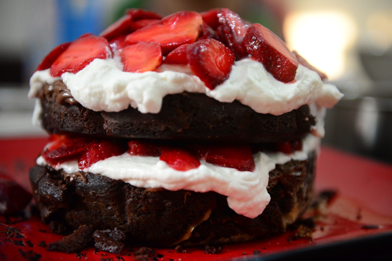 Strawberry Nutella Whipped Cream on A chocolate cake