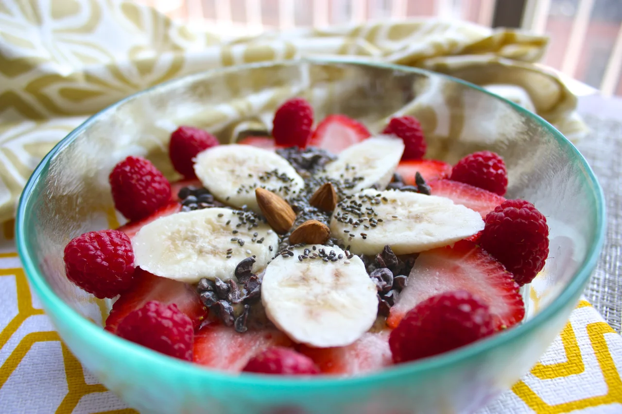 Detail: Greek Yogurt with Strawberries, Raspberries, Bananas, Cacao Nibs, Chia Seeds, and Almonds