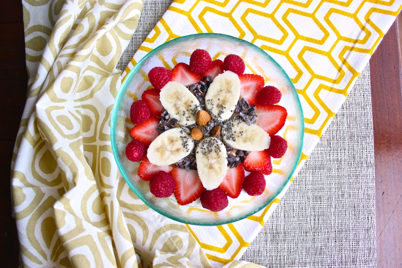 Greek Yogurt with Strawberries, Raspberries, Bananas, Cacao Nibs, Chia Seeds, and Almonds