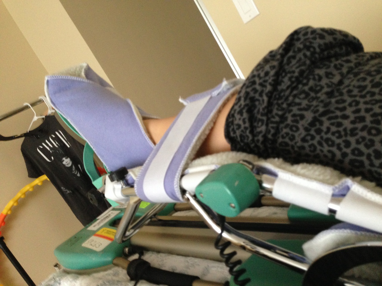 Called a CPM (continuous passive motion machine), I was best friends with this for 4 hours a day for 2 weeks. Don't think I don't see my mother's Cher tee in the background.