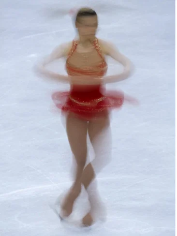 female-figure-skater-preforming-a-spin.jpg