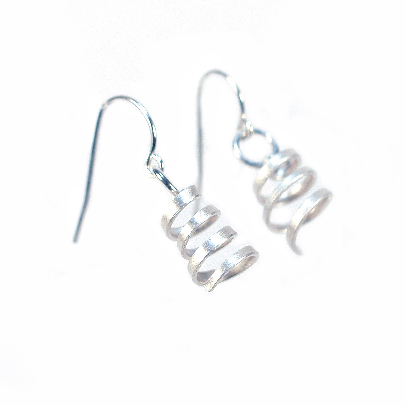 spiral dangle earrings in sterling silver