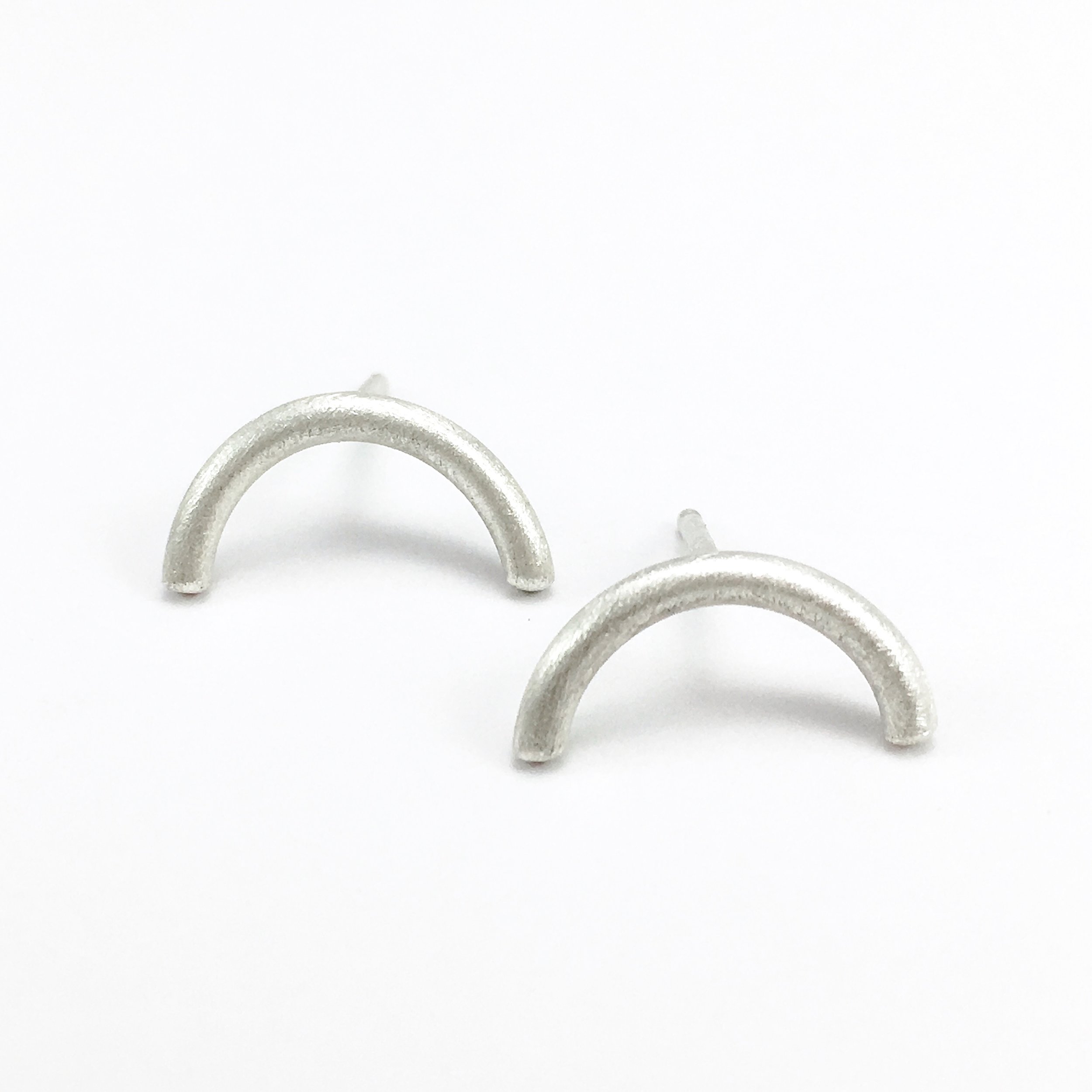 half circle ear-studs in brushed sterling silver