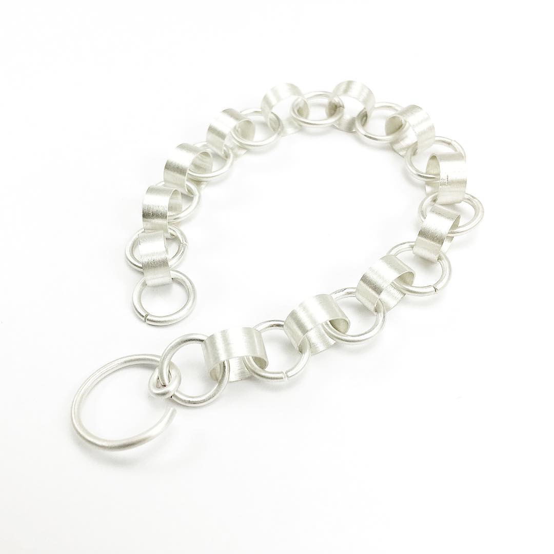 tube and circle link bracelet in brushed sterling silver