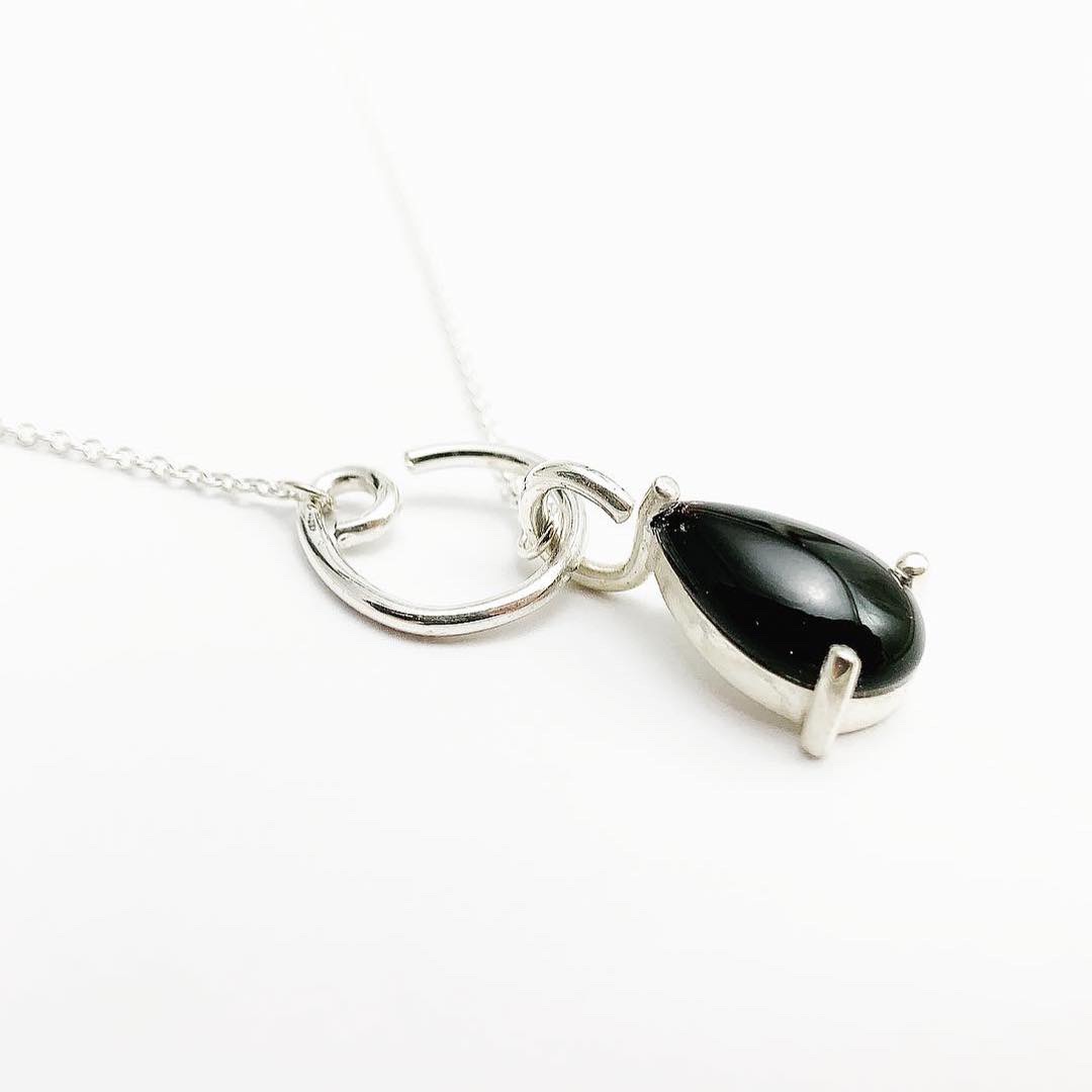 teardrop black onyx pendant in sterling silver