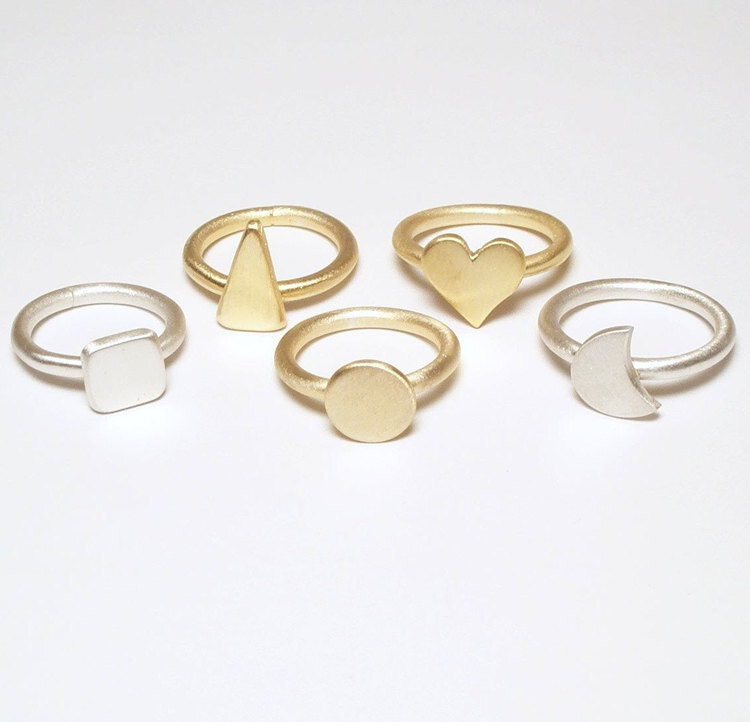 shape plate ring in fourteen karat gold