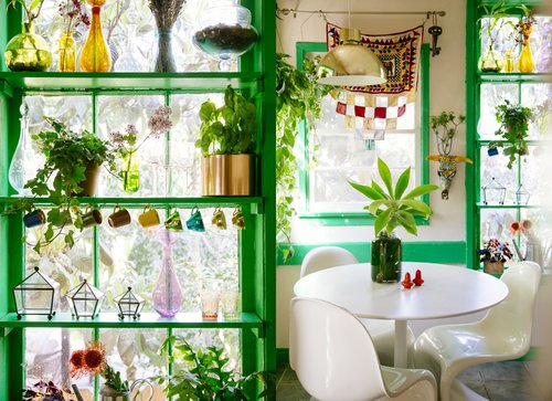 Justina Blakeney design - a kitchen with lots of bright green accents