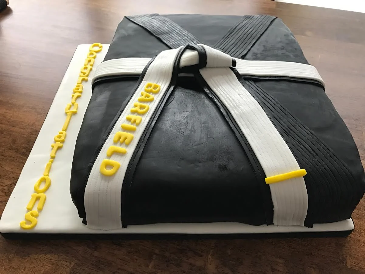 Black and white belt cake