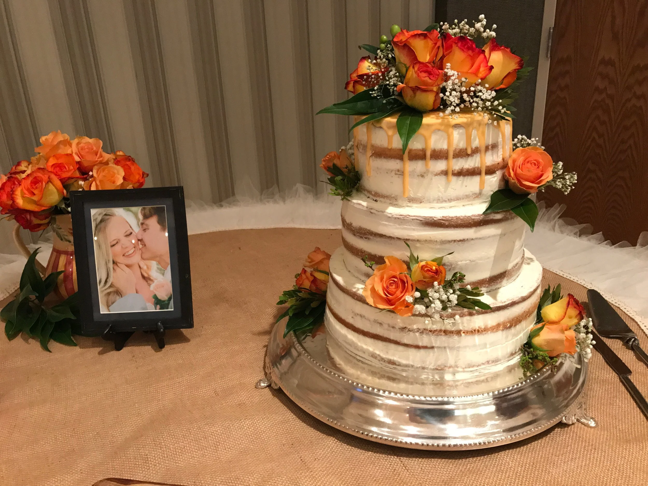 Naked wedding cake with ganache drizzle