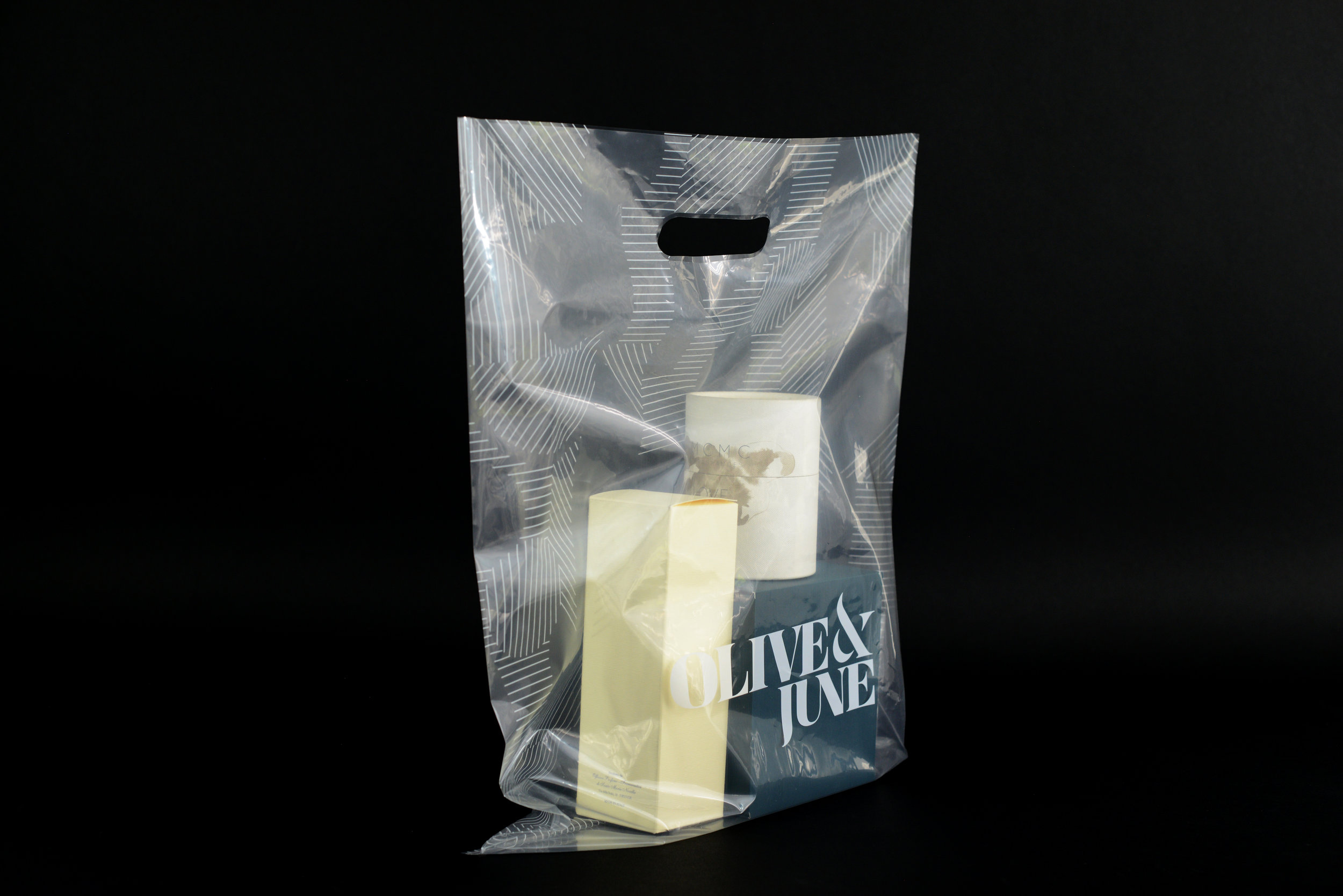 Olive & June LDPE plastic bags with diecut handles 