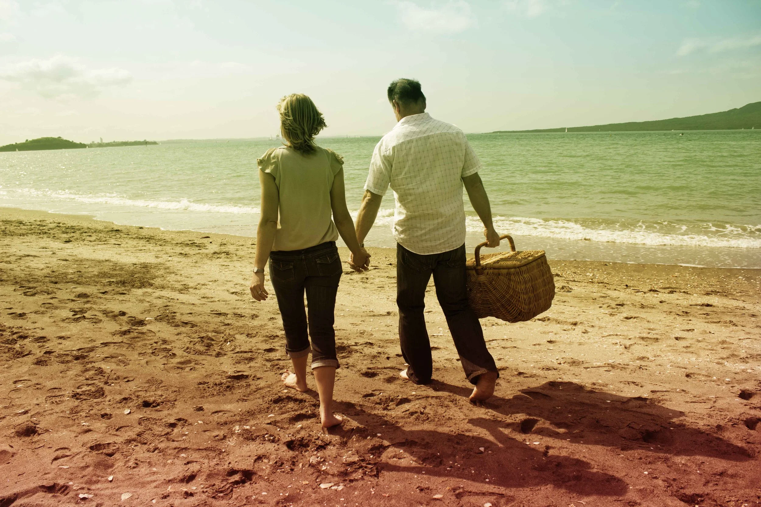 walking along beach rainbow.jpg