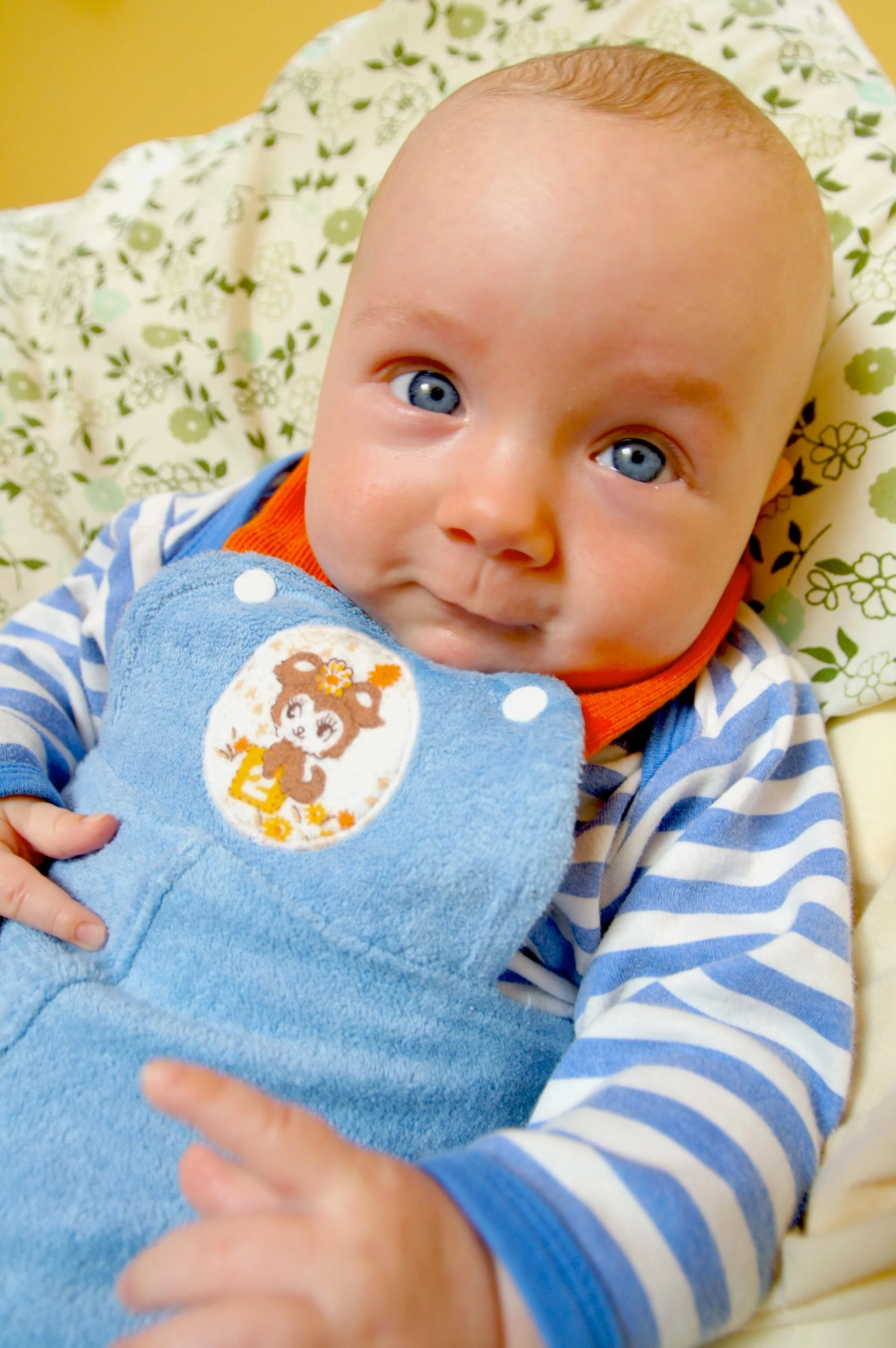 My favourite little baby outfit I ever made for Neko was this blue towelling number. It was pretty fantastically retro with it's bright orange straps and cuffs.