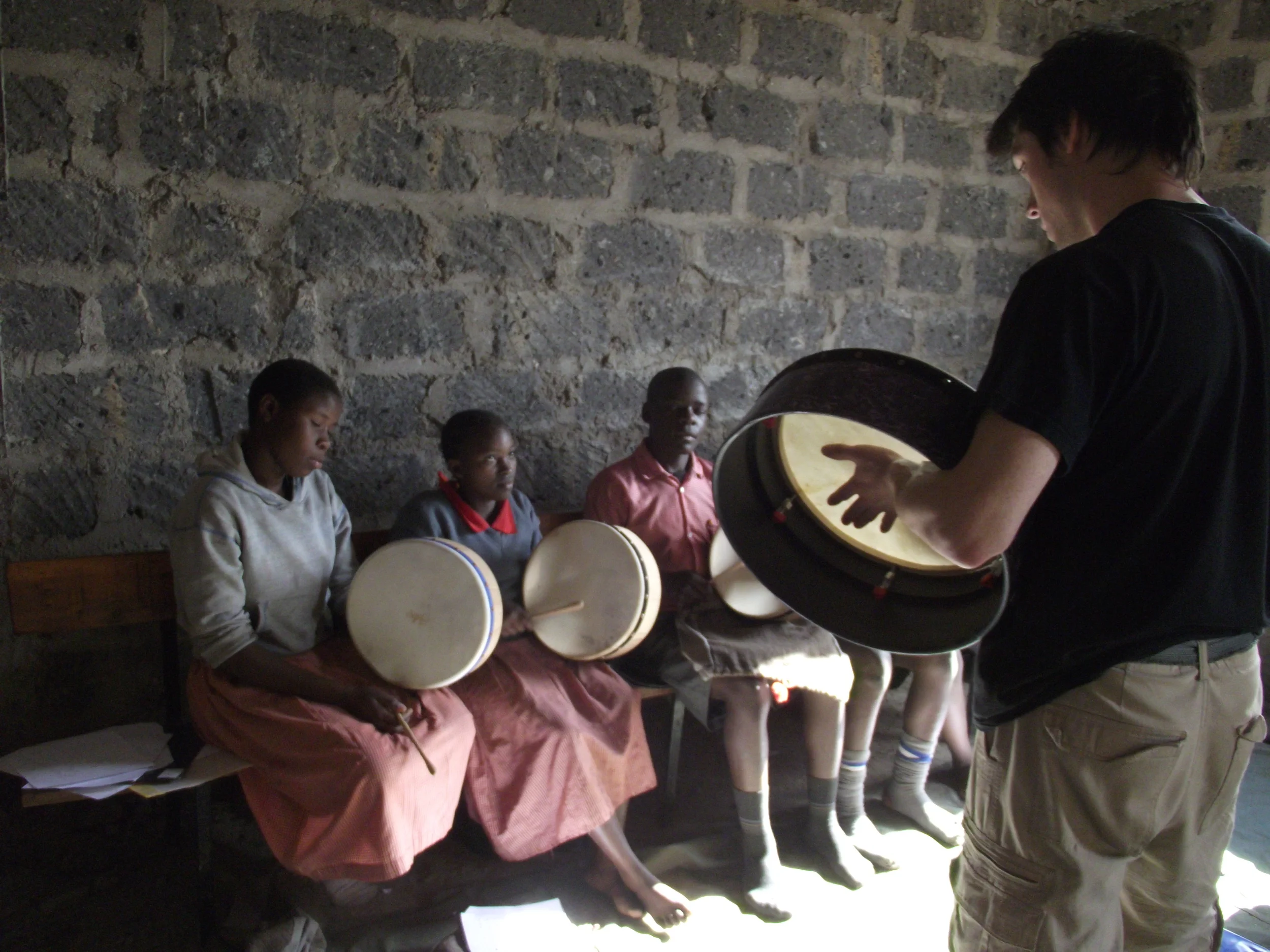 Gareth teaching Bodhran drums.JPG