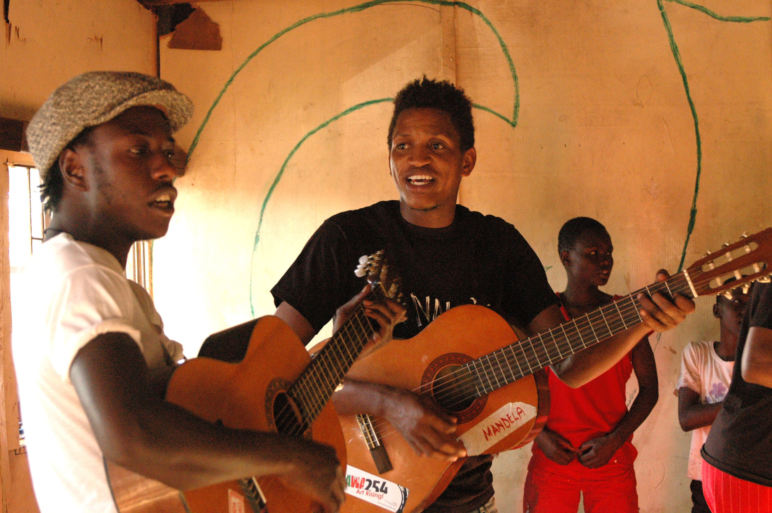 Music teachers Mandela and Mbau.JPG